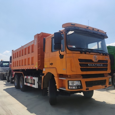 25-30 toneladas Capacidad Shacman 6X4 10 ruedas camión de descarga con remate ventral elevación hidráulica
