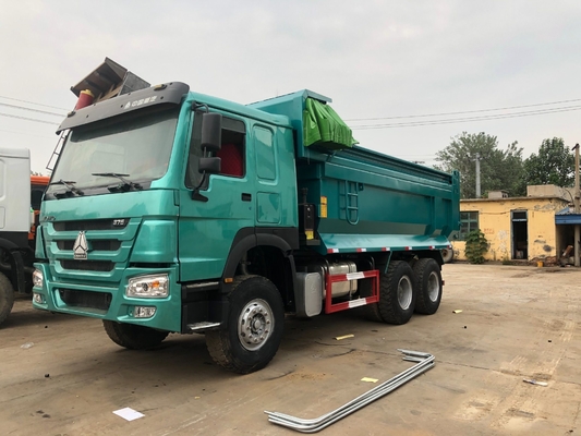 Elevación del volante ventral Elevación hidráulica Sinotruk 10 ruedas 6X4 camión de descarga con forma de U