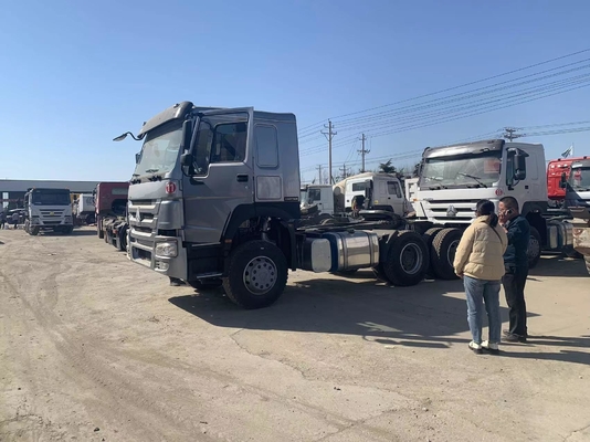 Carga diésel remolque 10 ruedas remolque cabeza de primer mover Sinotruk HOWO 6X4 camión tractor