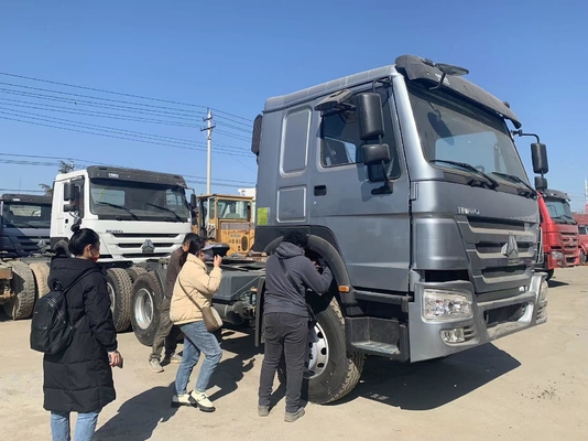 Carga diésel remolque 10 ruedas remolque cabeza de primer mover Sinotruk HOWO 6X4 camión tractor