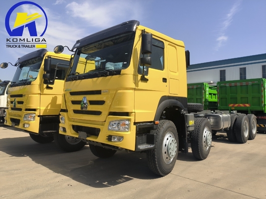 Sinotruk HOWO T7 8X4 400HP camión tractor de remolque de trabajo pesado con 5600X2300X1500 cubo