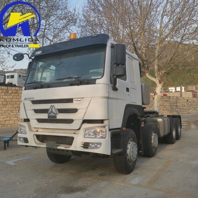Sinotruk HOWO T7 8X4 400HP camión tractor de remolque de trabajo pesado con 5600X2300X1500 cubo