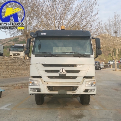 Sinotruk HOWO T7 8X4 400HP camión tractor de remolque de trabajo pesado con 5600X2300X1500 cubo