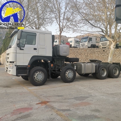 Sinotruk HOWO T7 8X4 400HP camión tractor de remolque de trabajo pesado con 5600X2300X1500 cubo