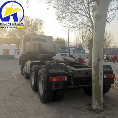 Sinotruk HOWO T7 8X4 400HP camión tractor de remolque de trabajo pesado con 5600X2300X1500 cubo