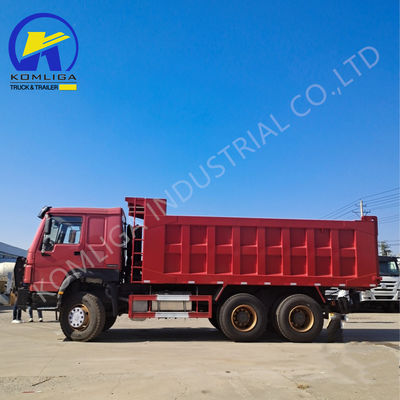 Sinotruk HOWO camión de descarga usado con elevación hidráulica con volante ventral en buenas condiciones