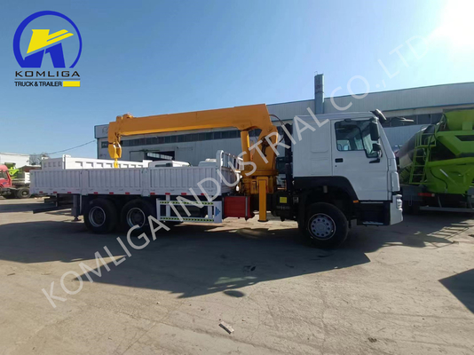Camión de carga usado 6X4 Sinotruk HOWO con grúa montada en buen estado y asequible
