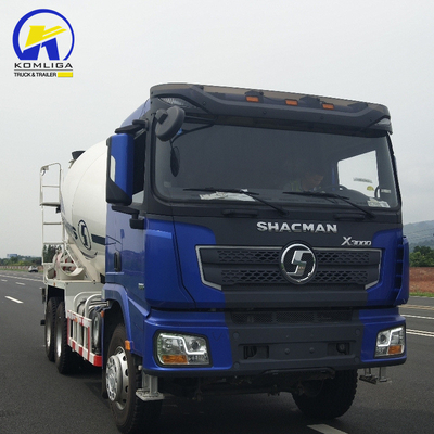 Shacman 6X4 camión mezclador de hormigón con rendimiento y levantamiento hidráulico de volante ventral