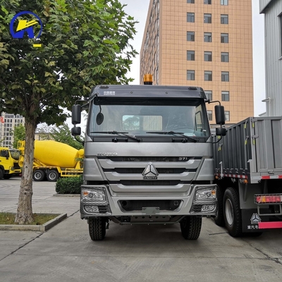 6X4 rueda motriz Sinotruk HOWO Camión de cercas de cama plana para el transporte de su carga