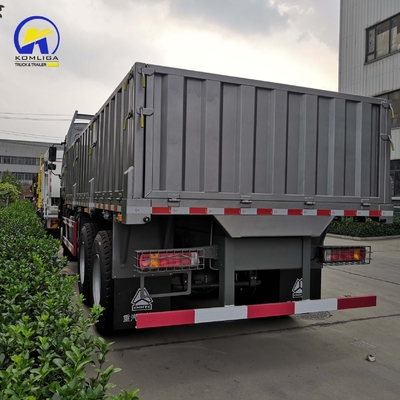 6X4 rueda motriz Sinotruk HOWO Camión de cercas de cama plana para el transporte de su carga