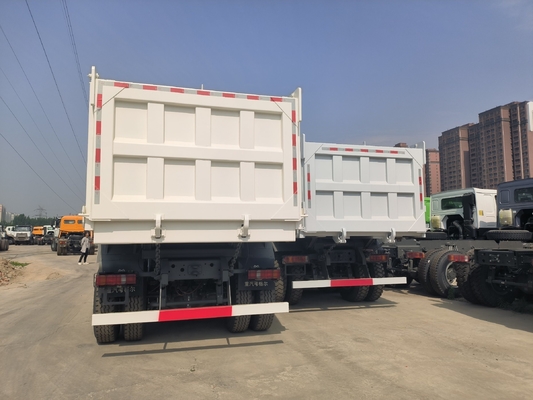 Estilo de elevación frontal HOWO 10 neumáticos 20cbm 6X4 camión de basura con transmisión manual