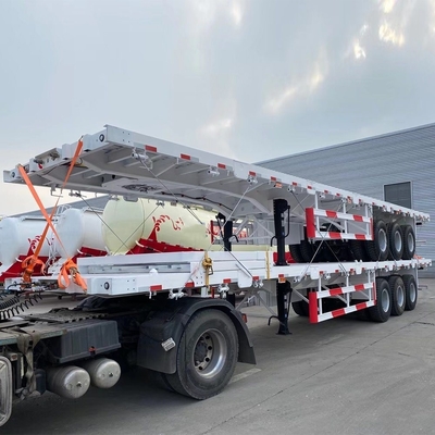 3 ejes 40FT 20FT remolque de cama plana con contenedor de bloqueo Jost dos velocidades de apoyo pierna