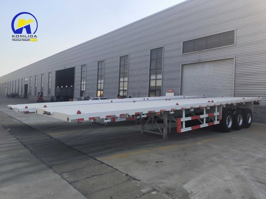 Sinotruk HOWO Semirremolque de cama plana con ejes Fuwa y viga lateral de acero de canal de 16 mm