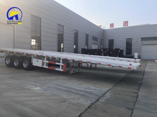 Sinotruk HOWO Semirremolque de cama plana con ejes Fuwa y viga lateral de acero de canal de 16 mm
