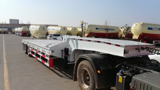 2-5 Ejes Sinotruk Semirremolque de lecho bajo con tren de aterrizaje 30-100t Capacidad 12 neumáticos